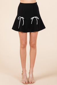 Two Bow Pleated Mini Skirt